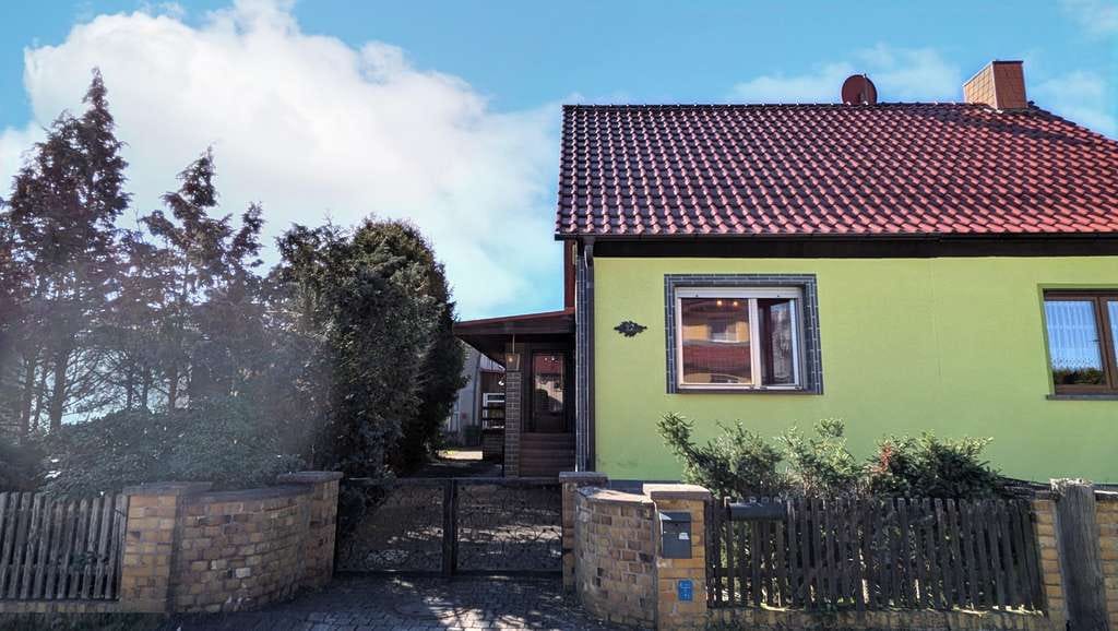 Immobilie in Oranienbaum-Wörlitz - Doppelhaushälfte mit großem Anbau - Bild 0