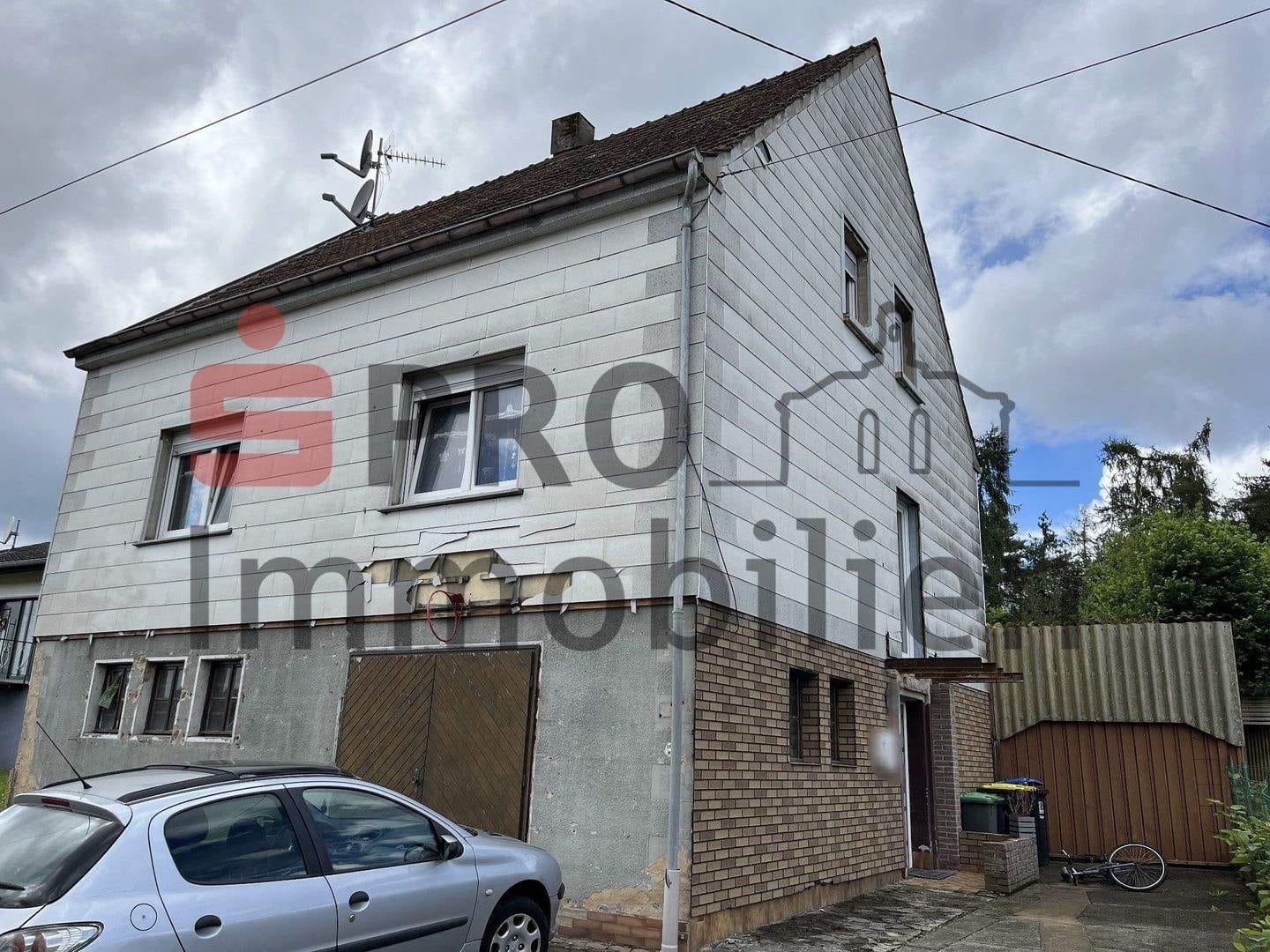 Immobilie in Großrosseln - Vermietetes Haus in ruhiger Lage! - Bild 1