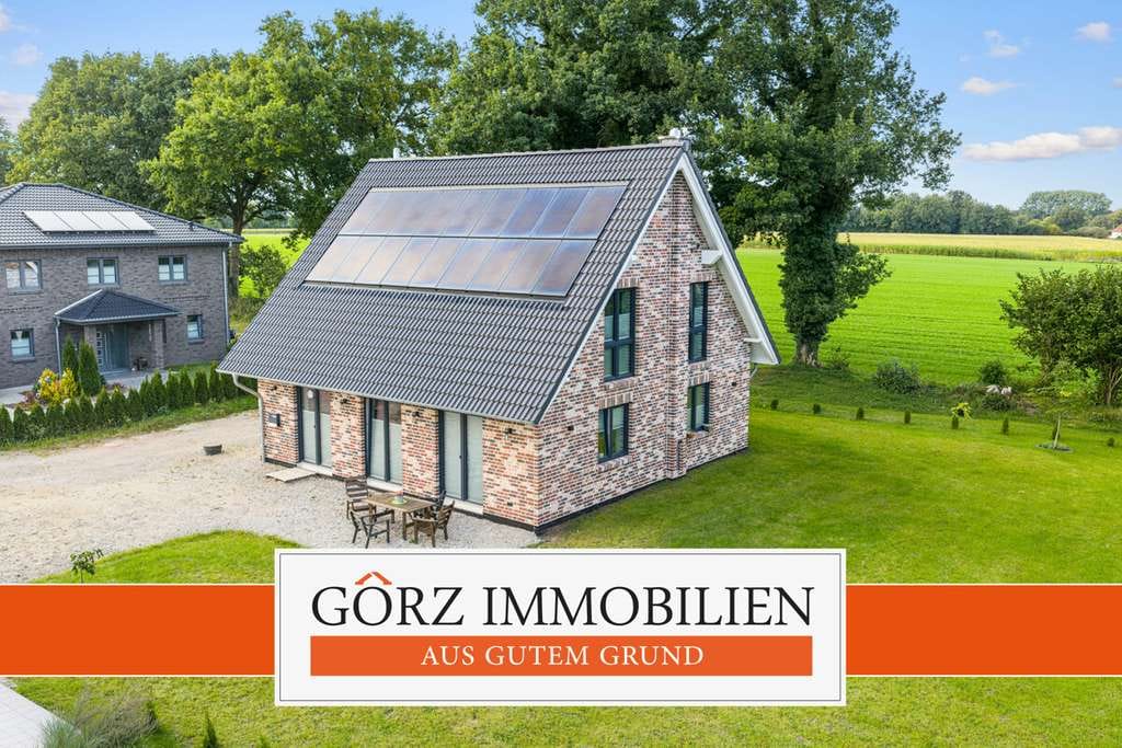Immobilie in Lutzhorn - Nachhaltiges KfW-40+ Familienhaus mit Smart-Home & PV in idyllischer Lage - Bild 0