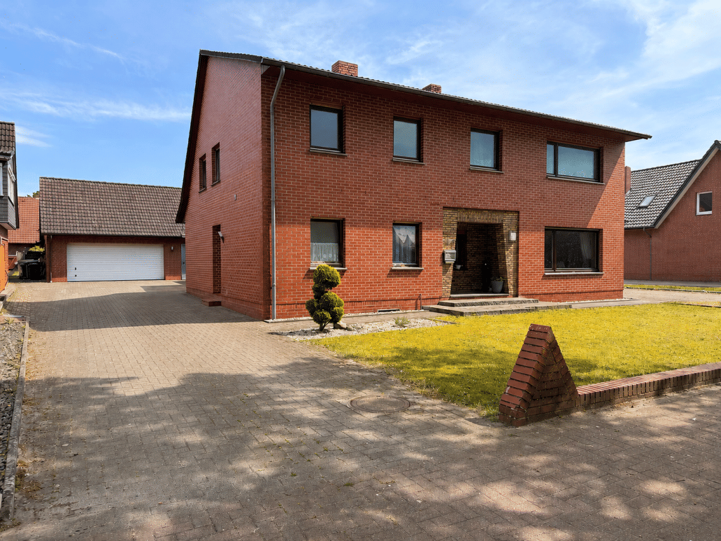 Immobilie in Garrel - Wohnen im Grünen - Charmantes Haus mit großem Garten und Nebenwohnung - Bild 0