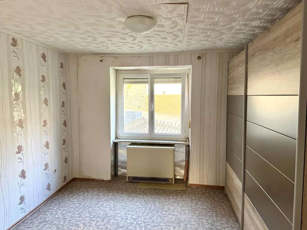 Immobilie in Hefersweiler - Hefersweiler: Renovierungsbedürftiges Einfamilienhaus mit großer Garage und Hofgelände - Bild 3
