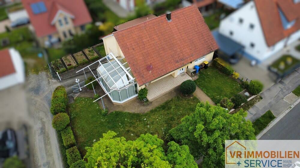 Immobilie in Bad Königshofen im Grabfeld - Wohnen auf einer Ebene mit Wintergarten & großem Garten in ruhiger Lage von 97631 Bad Königshofen! - Bild 3
