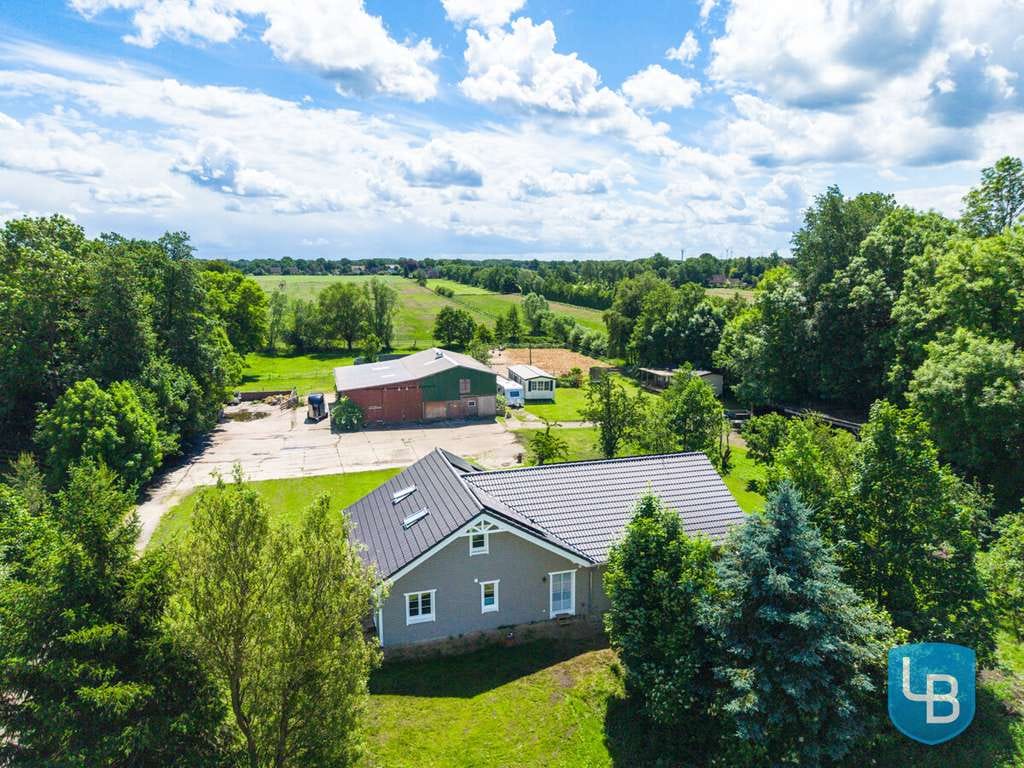 Immobilie in Kiebitzreihe - Wo Neubauqualität auf Hofcharakter trifft -außergewöhnliches Landanwesen mit Reitanlage und Halle - Bild 1