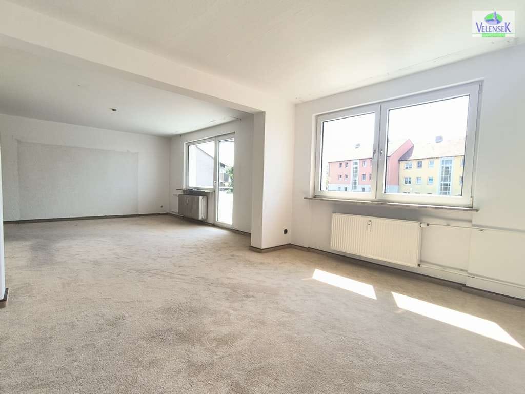 Immobilie in Wolfenbüttel - Helle 4-Zimmer-Eigentumswohnung mit neuem Balkon - Bild 2
