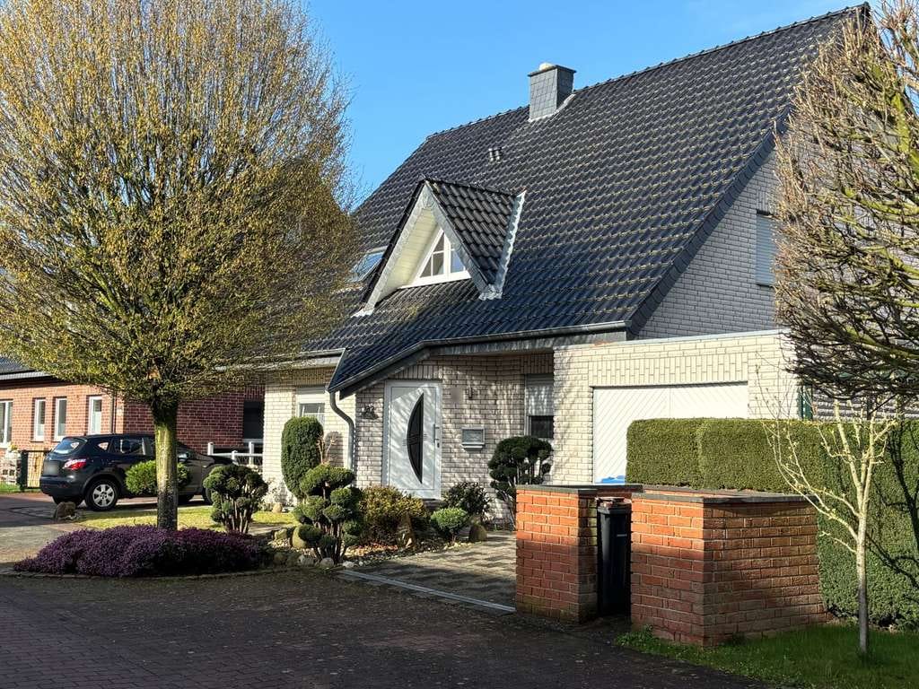 Immobilie in Reken - Familienfreundliches Einfamilienhaus mit Garten und Garage in ruhiger Lage von Reken - Bild 0