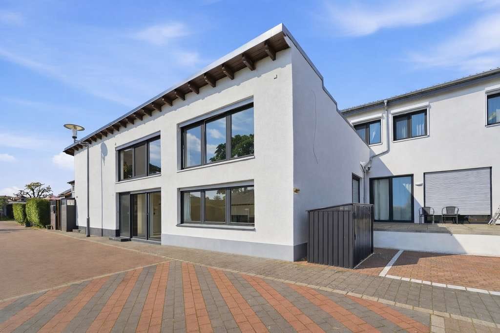 Immobilie in Münster (Hessen) - Exclusive  3 Zimmerwohnung mit Hauscharakter Münster-Altheim - Bild 0