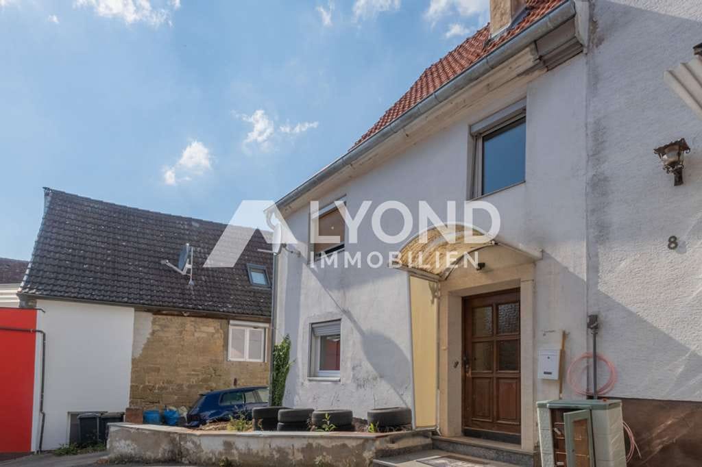 Immobilie in Kitzingen - Charmantes Einfamilienhaus mit großem Potenzial in ruhiger Lage von Kitzingen - Bild 1