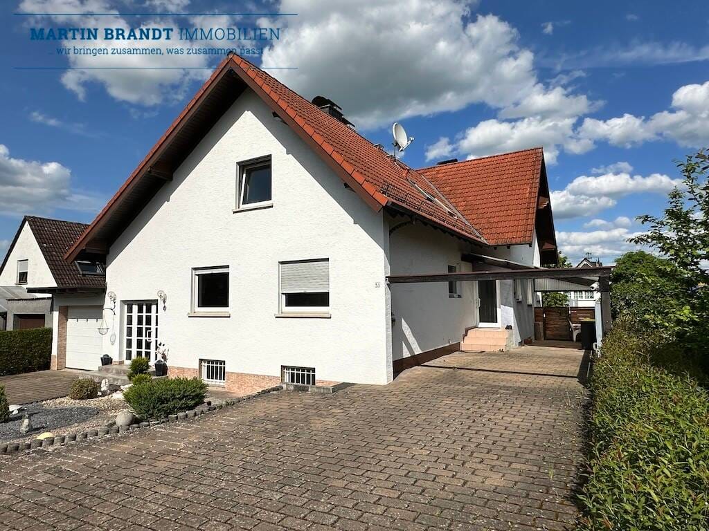 Immobilie in Hünstetten - Attraktives 2 Familienhaus mit großen Garten in schöner Wohnlage von Idstein-Wörsdorf - Bild 0