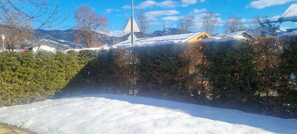 Immobilie in Bad Wiessee - Barrierearme Gartenwohnung am Tegernsee mit Kamin in Top-Zustand – sofort bezugsbereit! - Bild 1