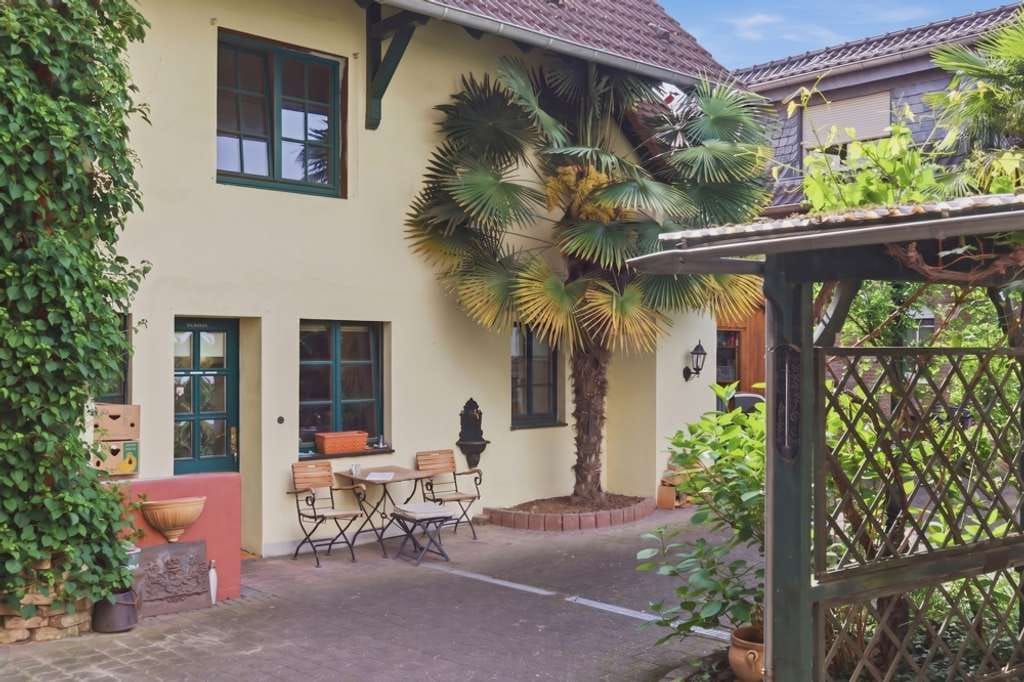 Immobilie in Bornheim - Südländisches Ambiente auf 3 Ebenen - Bild 3