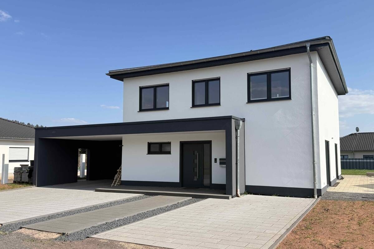 Immobilie in Bausendorf - Hochwertiges Einfamilienhaus in attraktiver Neubaugebietslage von Bausendorf - Bild 1