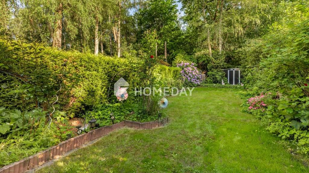 Immobilie in Isenbüttel - Naturnahes Wohnen am Tankumsee: Gepflegtes Haus mit geschützter Terrasse, Garten und Carport  - Bild 4