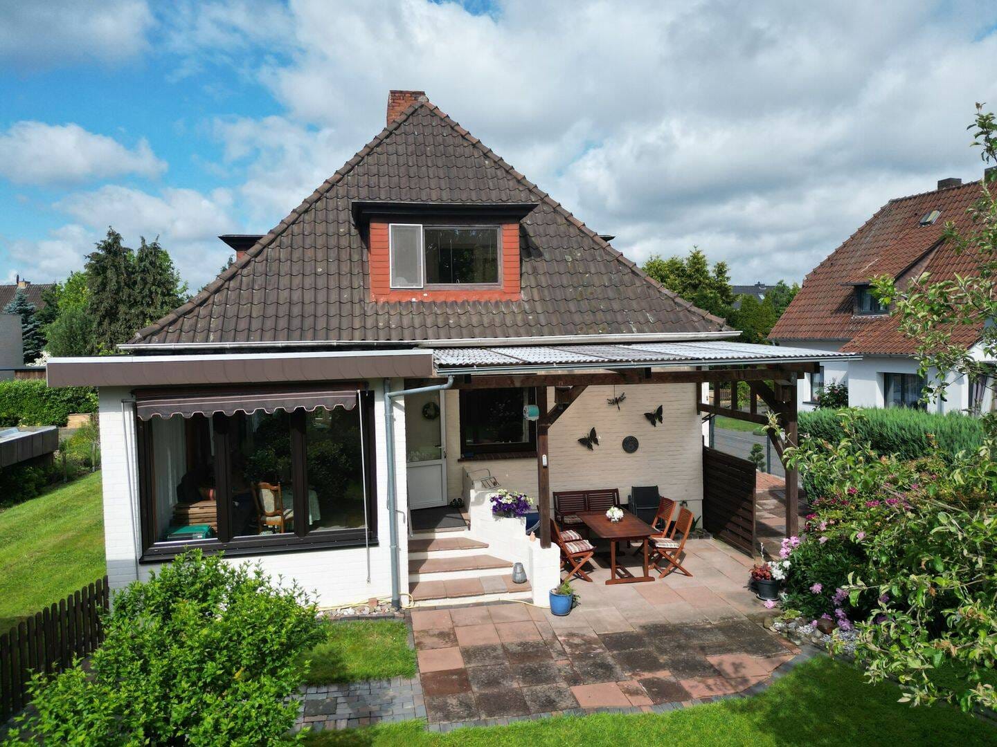Immobilie in Hilgermissen - Bungalow mit besonderem Charme und idyllischem Garten in zentrumsnaher Lage - Bild 2