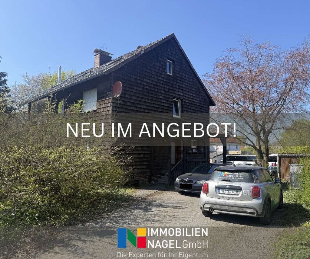 Immobilie in Hessisch Oldendorf - Ihre Chance: Dreifamilienhaus mit Garten, Balkon & zwei freien Wohnungen - Bild 0
