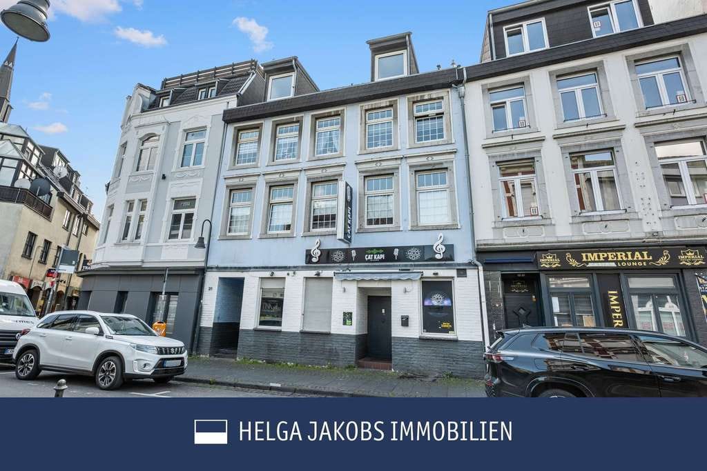 Immobilie in Eschweiler - Unter 725 €/m²: Gründerzeithaus mit Ertrag und Entwicklungspotenzial – Eschweiler - Bild 0