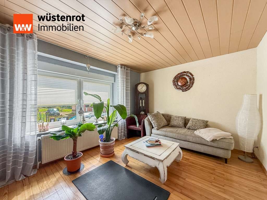 Immobilie in Merchweiler - Einziehen statt renovieren – Einfamilienhaus mit Wintergarten, 2 Bädern und Garage - Bild 2