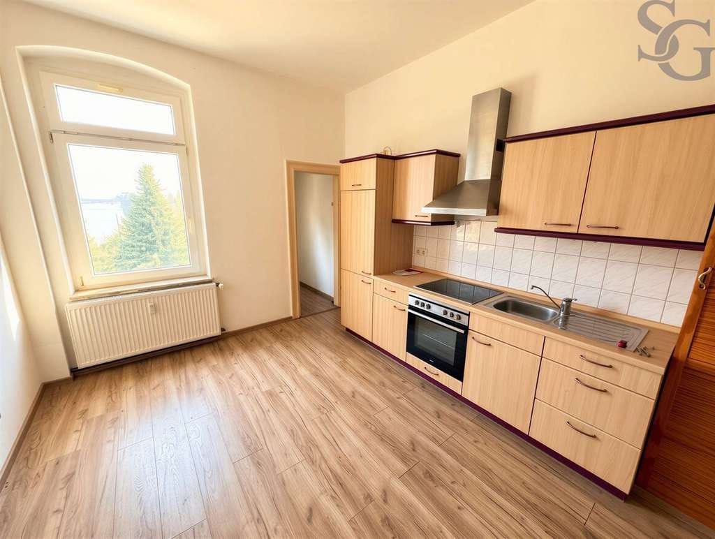 Immobilie in Leisnig - Einmalige Gelegenheit! Bezugsfertige Wohnung mit Dachgeschossrohling zum Ausbau - Bild 1