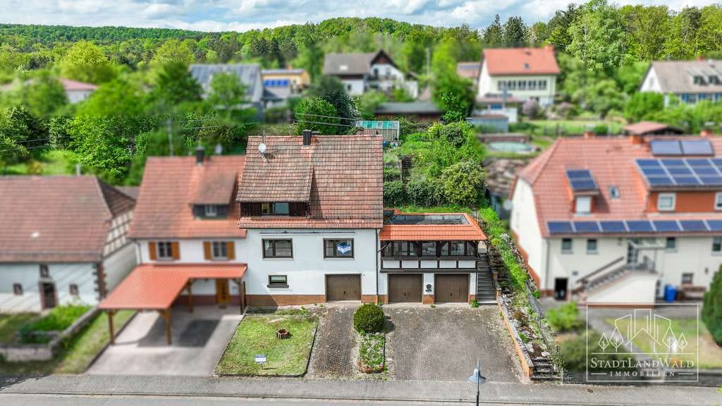 Immobilie in Ludwigswinkel - DHH mit Wintergarten, großer Terrasse, 3 Garagen und Garten in Ludwigswinkel - Bild 1