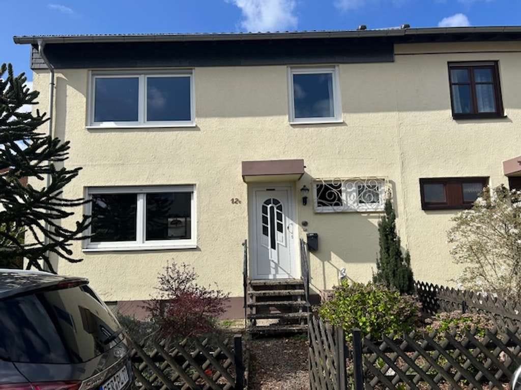 Immobilie in Rülzheim - DHH  mit Wintergarten, zwei Garagen und Garten - Bild 1
