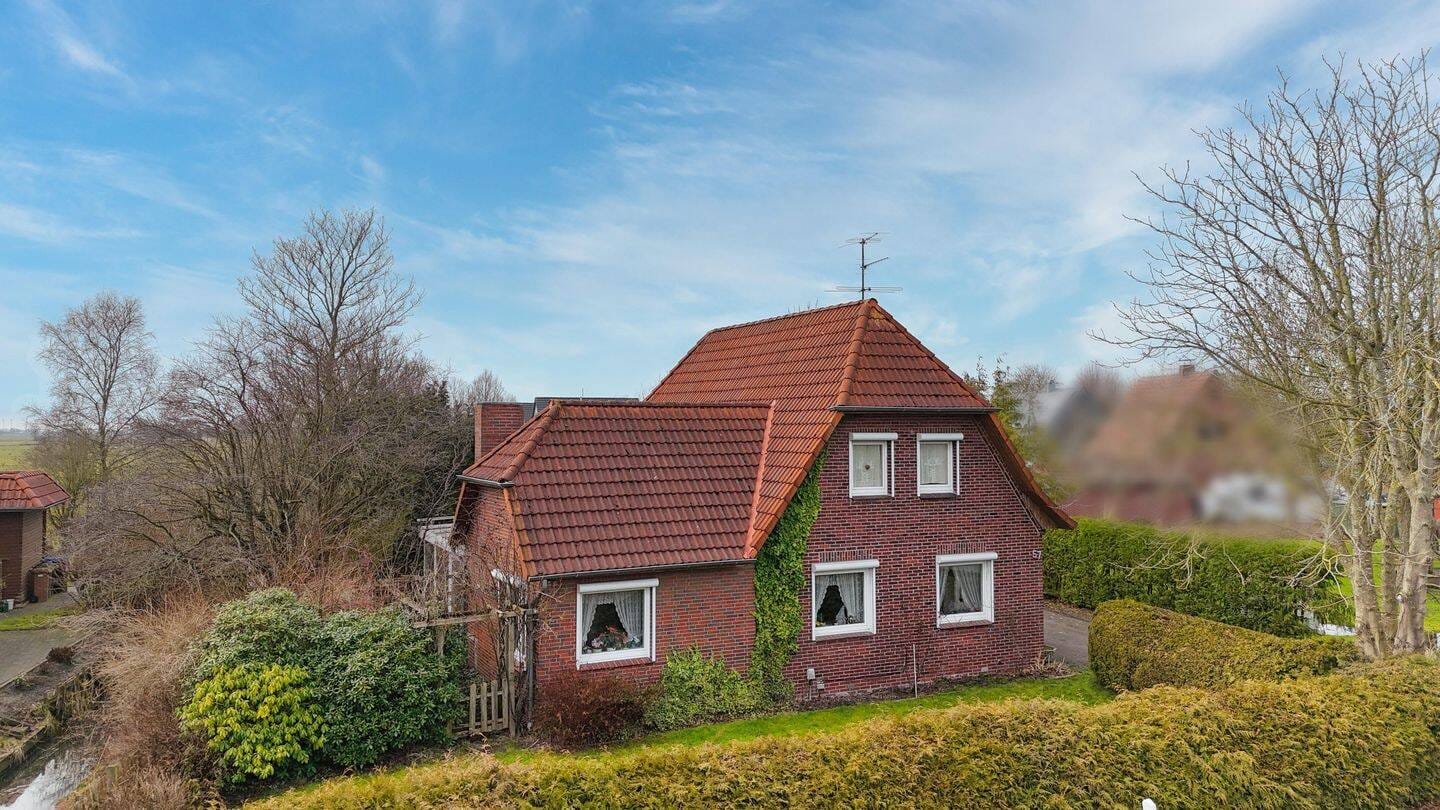Immobilie in Nordenham - Freistehendes Einfamilienhaus mit Wintergarten, Sauna und viel Potenzial in Nordenham-Phiesewarden - Bild 0