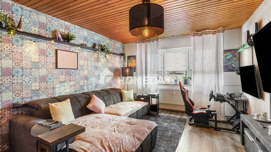 Immobilie in Lich - Gepflegte Drei-Zimmer-Erdgeschosswohnung mit zwei Stellplätzen und idyllischem Gemeinschaftsgarten - Bild 1