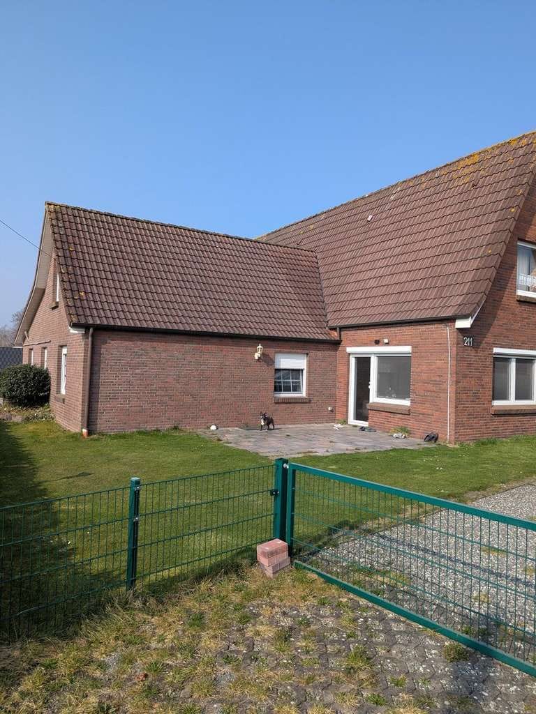 Immobilie in Südbrookmerland - Modernisiertes Wohnhaus mit Einliegerwohnung in ruhiger Alleinlag - Bild 1