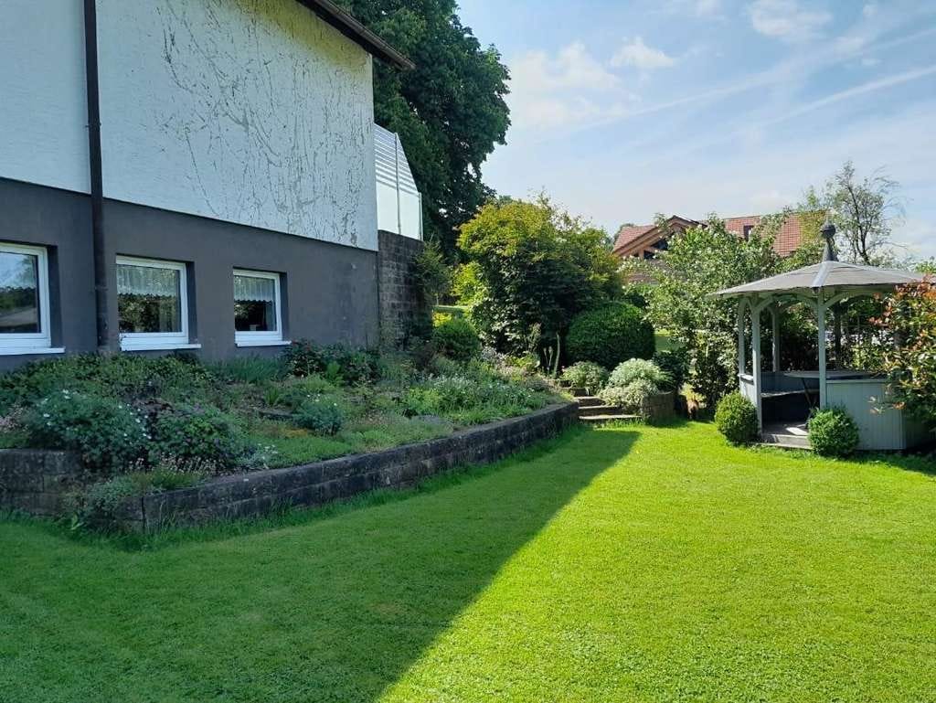 Immobilie in Bühlerzell - Einfamilienhaus mit Gewerbeeinheit - Bild 1