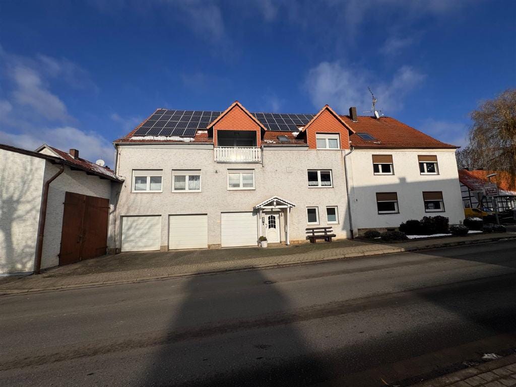 Immobilie in Grebenstein - Zwei Doppelhaushälften aus unterschiedlichen Baujahren in ruhiger Lage von Udenhausen - Bild 1