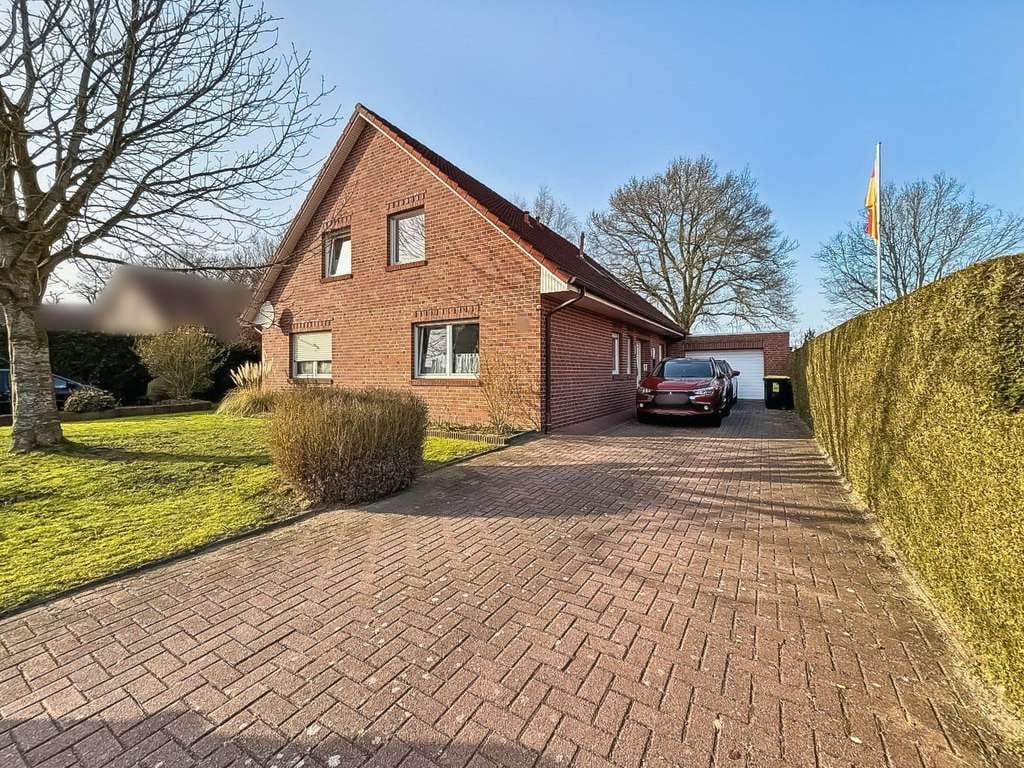 Immobilie in Großefehn - Modernes Zweifamilienhaus mit viel Platz in ruhiger Lage von Großefehn mit Blick ins Grüne - Bild 0