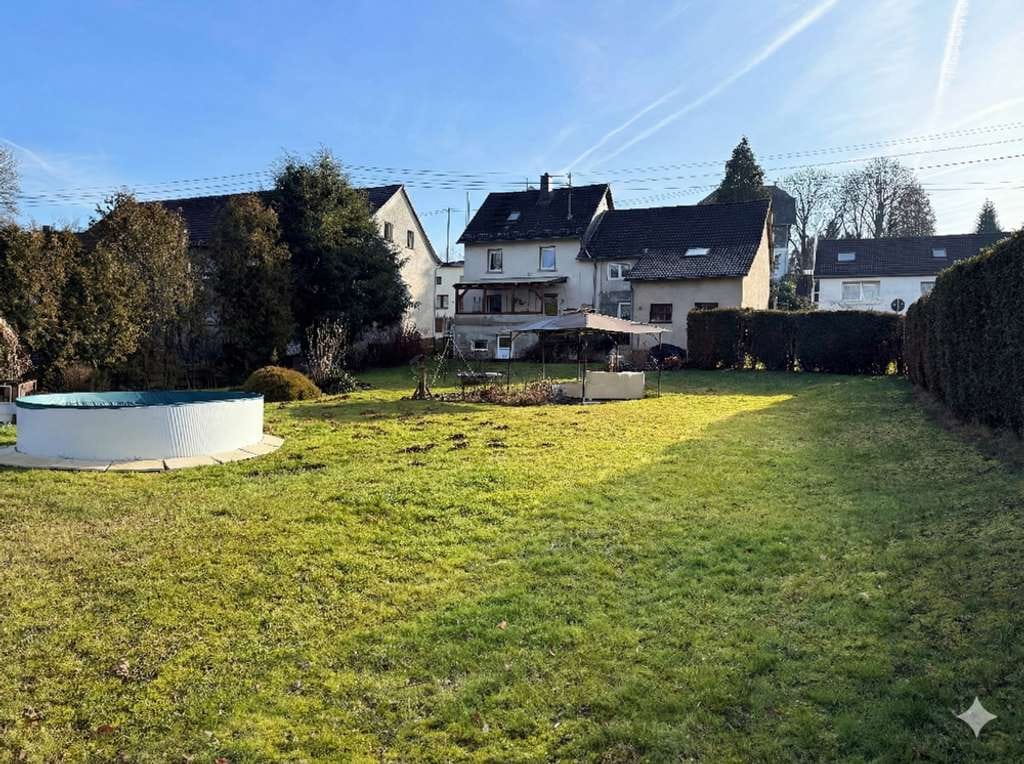 Immobilie in Ratzert - Großzügiges Einfamilienhaus mit Doppelgarage und Garten in Woldert! - Bild 2