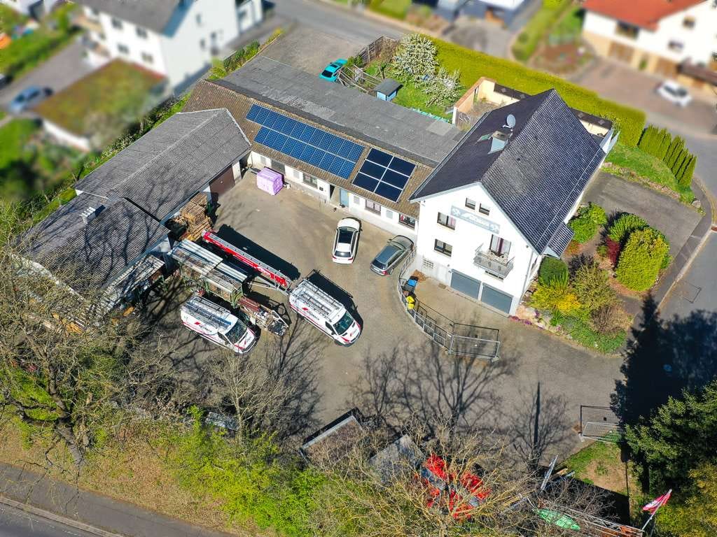 Immobilie in Neuhof - Attraktives Wohnhaus mit vermieteter Gewerbefläche – komfortables Wohnen und sichere Rendite in eine - Bild 3