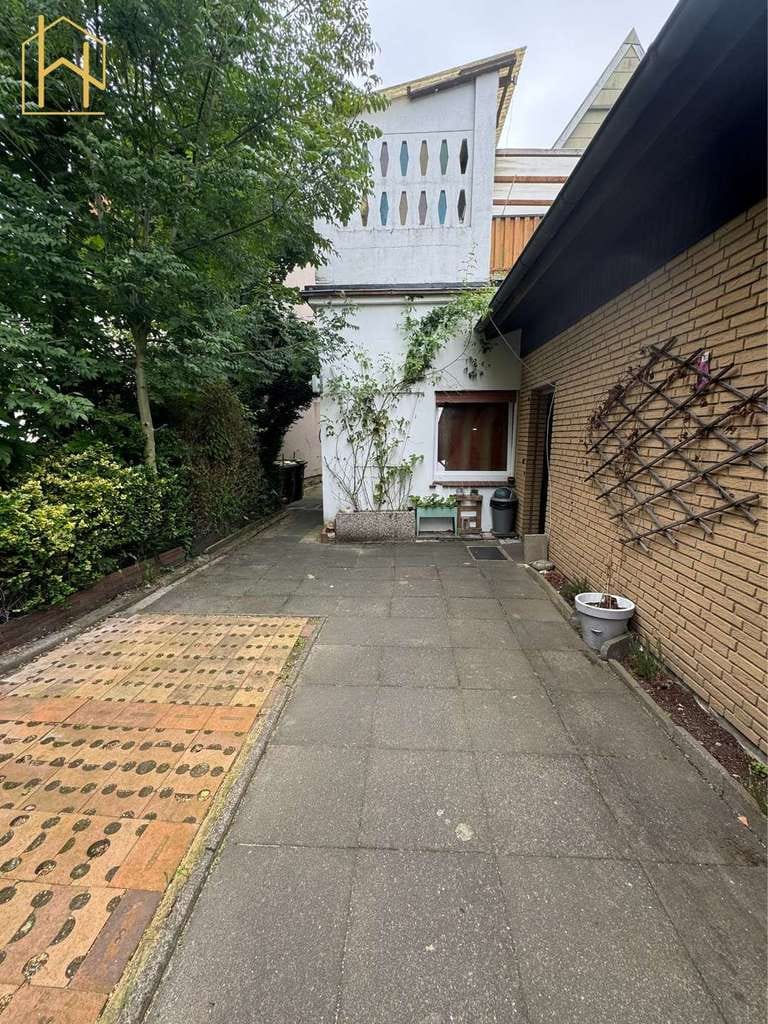 Immobilie in Melle - Solides Zweifamilienhaus mit gesicherten Mieteinnahmen und Eigennutzungspotenzial - Bild 3