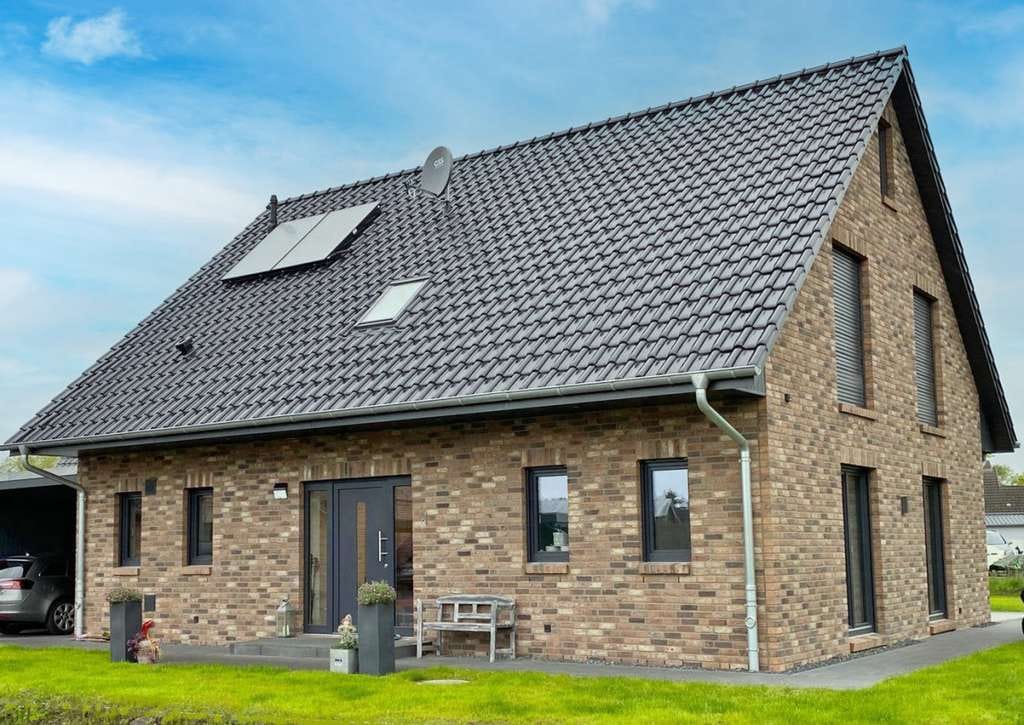 Immobilie in Beldorf - Gemütliches Familienhaus im klassischen Stil 
Neubauplanung - Niedrigenergiehaus mit Wärmepumpe - Bild 1