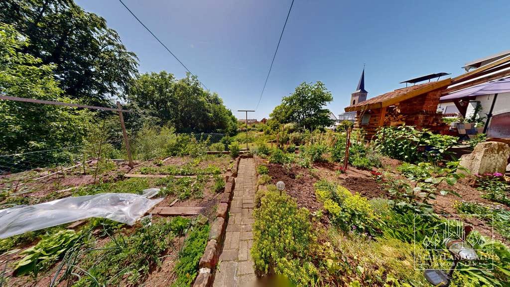 Immobilie in Clausen - Gepflegtes Zweifamilienhaus mit großem Garten, Carport und Garagen in Clausen - Bild 3
