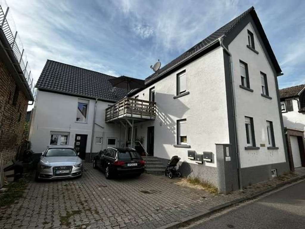 Immobilie in Bobenheim-Roxheim - Vermietetes 3-Familienhaus für Eigennutzer oder Kapitalanleger - Bild 0