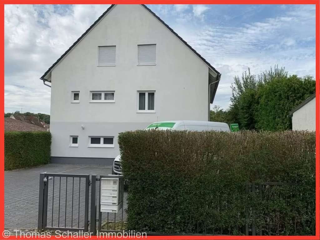 Immobilie in Mühltal - Charmante und helle Souterrainwohnung mit eigener Terrasse in Nieder-Ramstadt! - Bild 1