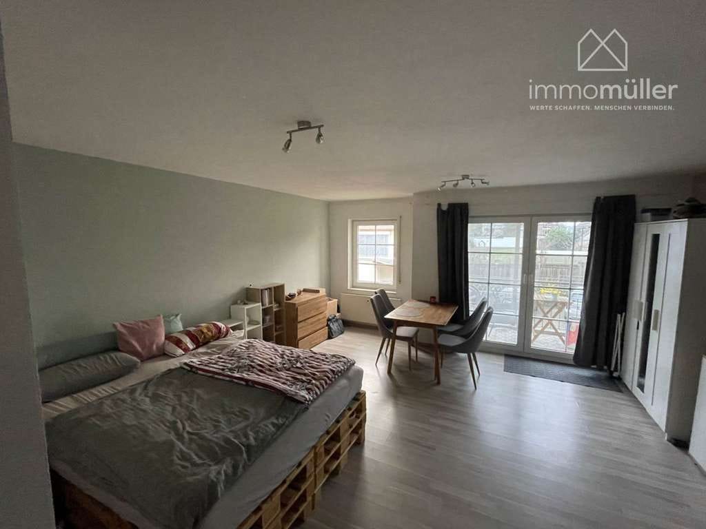Immobilie in Ubstadt-Weiher - Helle & freundliche 1Zimmer-Wohnung mit Tiefgarage, Balkon und Einbauküche in Ubstadt-Weiher - Bild 1