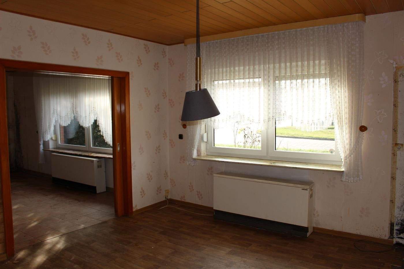 Immobilie in Moormerland - Freistehendes Einfamilienhaus mit 6 Zimmern und großem Grundstück in 26802 Moormerland - Warsingsfehn - Bild 1
