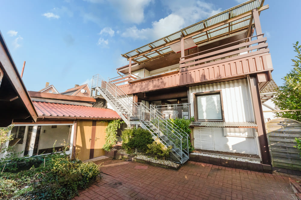 Immobilie in Uelsen - Einfamilienhaus mit viel Platz - Nebengebäude und Weitblick - Bild 1