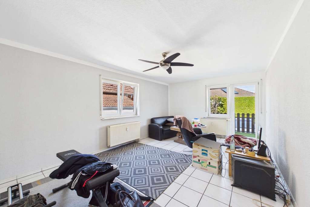 Immobilie in Stockstadt - Helle 2-Zimmer-Eigentumswohnung mit Balkon, Stellplatz und langjährigem Mietverhältnis - Bild 1