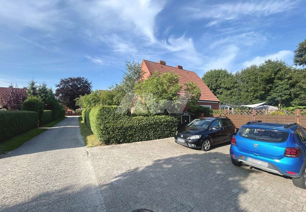 Immobilie in Großheide - Einfamilienhaus mit Sommergarten in Großheide!
Objekt-Nr.: 25-078-S - Bild 1
