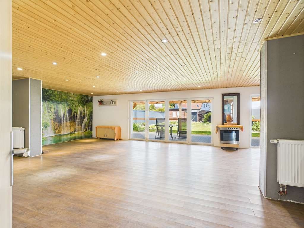 Immobilie in Putlitz - Einfamilienhaus mit Wow: lichtdurchflutet, modernisiert & uneinsehbar. - Bild 4