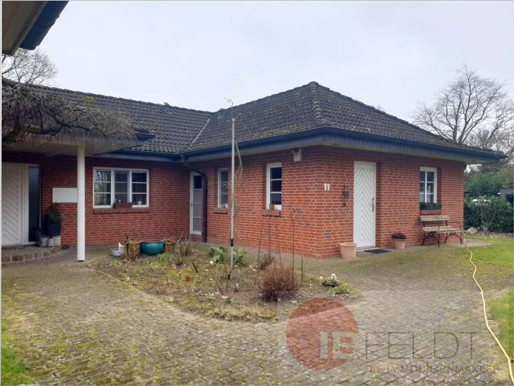 Immobilie in Kattendorf - Idyll am Rande Hamburgs: Ebenes Wohnhaus mit wertiger Ausstattung, Carport + Garten mit Ausblick - Bild 3