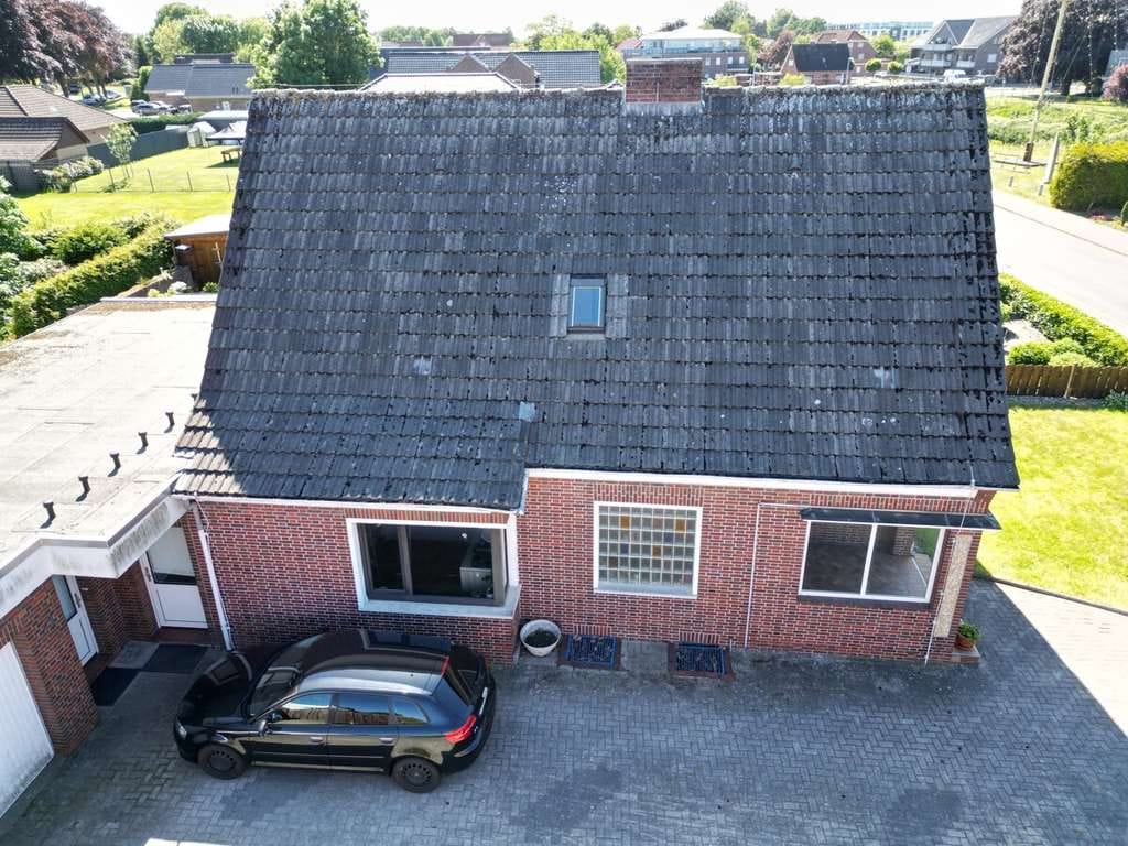 Immobilie in Moormerland - Einfamilienhaus mit Einliegerwohnung in
guter - zentraler Wohnlage - Bild 3