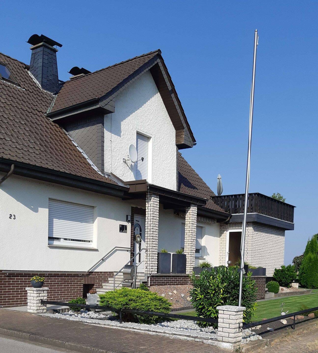 Immobilie in Borgentreich - Attraktives Einfamilienhaus mit großem Garten und 2 Garagen in Borgentreich - Bild 0