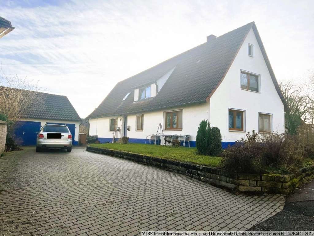 Immobilie in Schrozberg - Gepflegtes Wohnhaus mit 3 gemütlichesn Wohnungen, 2 Garagen und großem Garten - Bild 0