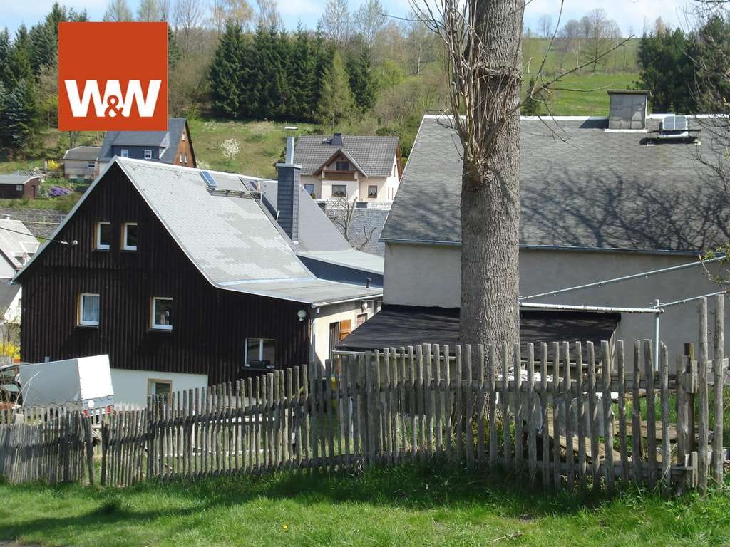 Immobilie in Jöhstadt - Einfamilienhaus mit Sanierungsbedarf und großem Nebengebäude - Bild 0