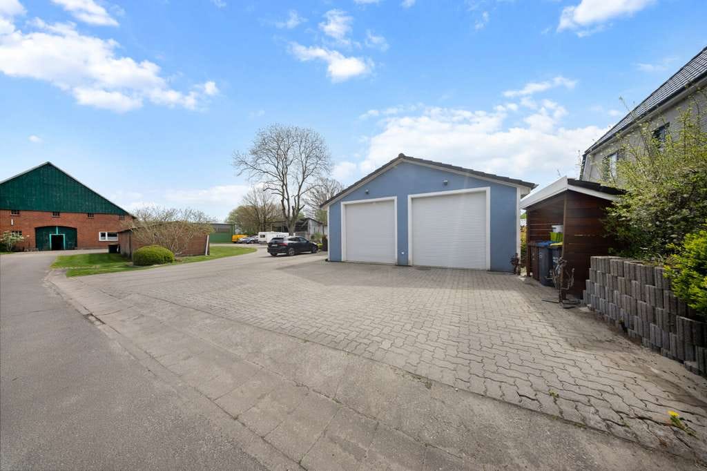Immobilie in Arpsdorf - Haus mit moderner Technik, großem Wintergarten und 3 Garagen in Arpsdorf - Bild 4