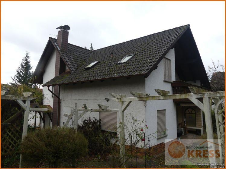 Immobilie in Bad Soden-Salmünster - Ein Doppelhaus mit 2 Gesichtern sowie übergroßem Grundstück mit Carport in BSS-Eckardroth - Bild 0