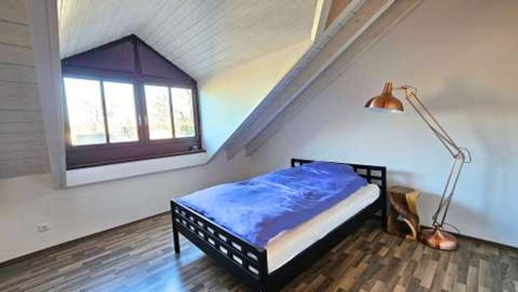 Immobilie in Neubiberg - Eizigartige Loft-DG-Wohnung mit Sichtdachstuhl u. Sonnenbalkon - Bild 4